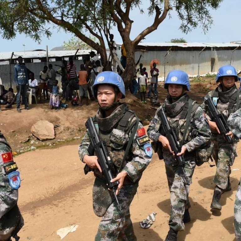Chinese peacekeepers escort the Regional Director for Africa for the International Committee of the Red Cross (ICRC) during a visit to Tibesti, in the Lake Chad Region. Shandong Weiqiao and its parent consortium SMB-Winning have undertaken to assist the Chadian government to effectively operate several gold mines long its borders with Niger and Libya.