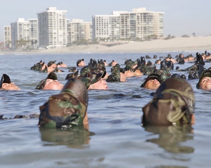 Navy SEAL trainees at BUDS in the water of Glorietta Bay, within shouting distance of the Hotel Del Coronado.
