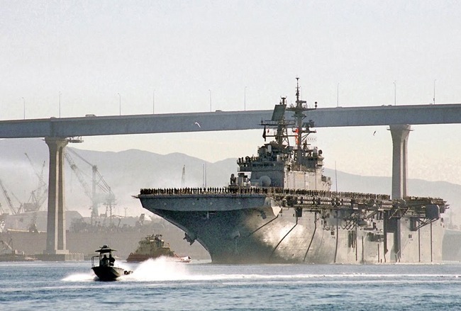 The USS Bonhomme Richard (LHD-6) passing under the Coronado Bride before her untimely death, departing for operations in the South China Sea. Image cut from a panoramic photo taken by tourists atop the Hotel Del Coronado.
